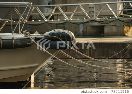 Bow of a small vessel moored at the port Bow of a small vessel moored at the port 78311916