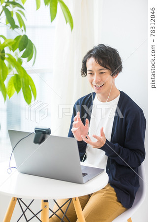 Young men communicating online Young men communicating online 78312046
