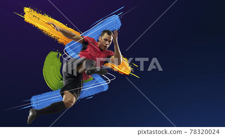 Young man, soccer footbal player training isolated in neon light on blue background. Art collage. Watercolor paints. Concept of sport, game, action. Young man, soccer footbal player training isolated in neon light on blue background. Art collage. Watercolor paints. Concept of sport, game, action. 78320024