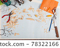 Handmade wooden fishing tacles graph paper background with tools and blanks. 78322166