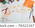 Handmade wooden fishing tacles graph paper background with tools and blanks. 78322167