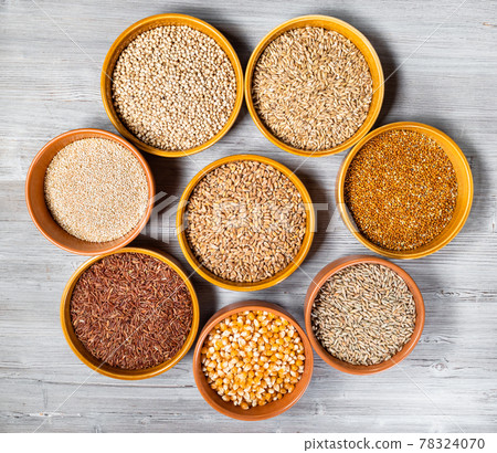 various wholegrain grains in round ceramic bowls various wholegrain grains in round ceramic bowls 78324070