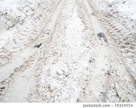 uncleared snow covered surface of city road uncleared snow covered surface of city road 78324554