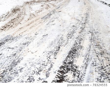 ice and dirty snow covered surface of city road ice and dirty snow covered surface of city road 78324555