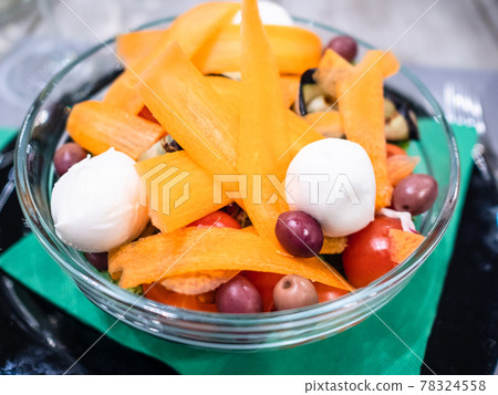 salad from cherry tomatoes with carrot close up 78324558