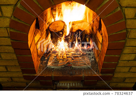 above view of fireplace with burning firewood 78324637