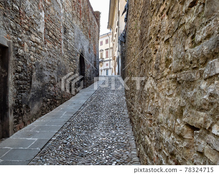 narrow street between stone walls in Bergamo narrow street between stone walls in Bergamo 78324715