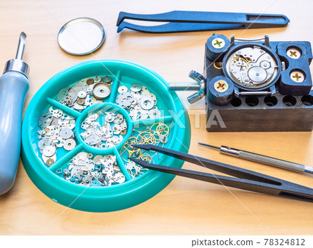 various watch repairing tools and spare parts 78324812