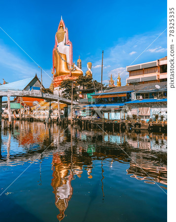 Around the khlong near Wat Paknam Bhasicharoen, a temple, pagoda and Buddha statue in Bangkok Around the khlong near Wat Paknam Bhasicharoen, a temple, pagoda and Buddha statue in Bangkok 78325335