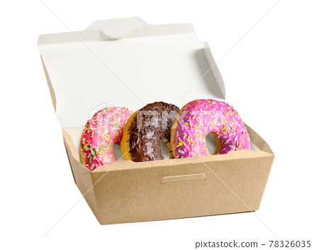Glazed Doughnuts in paper box isolated on white background. Glazed Doughnuts in paper box isolated on white background. 78326035