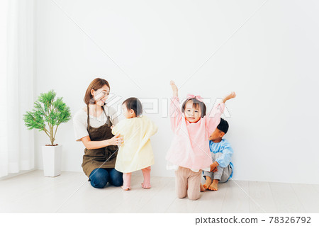 Children and nursery teachers playing in kindergarten Children and nursery teachers playing in kindergarten 78326792