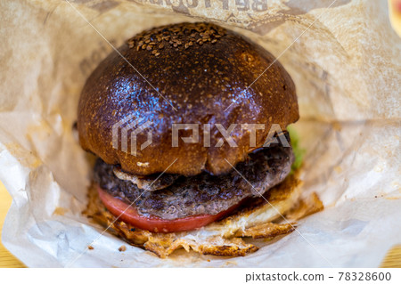 Handmade brown hamburger with smoked bacon Handmade brown hamburger with smoked bacon 78328600