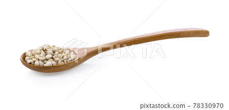 Pile of Job's tears ( Adlay millet) in wood spoon on white background. 78330970