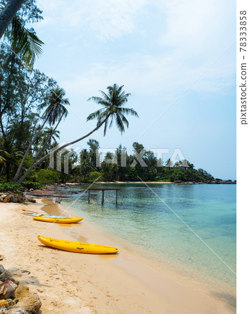 Yellow Kayak boat on tropical island beach bright sun in summer. Koh Kood - Thailand 78333858