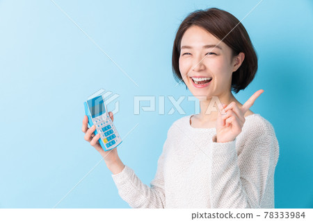 Calculator and woman smile 78333984