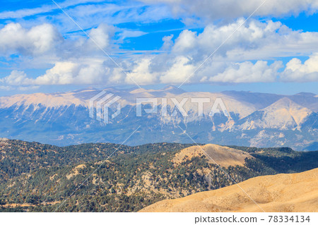 View of the Taurus mountains from a top of Tahtali mountain near Kemer, Antalya Province in Turkey View of the Taurus mountains from a top of Tahtali mountain near Kemer, Antalya Province in Turkey 78334134