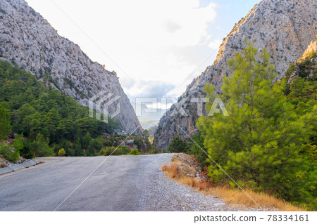 Winding asphalt road in the Taurus mountains in Turkey Winding asphalt road in the Taurus mountains in Turkey 78334161