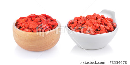 dried goji berries in a bowl on white background 78334678