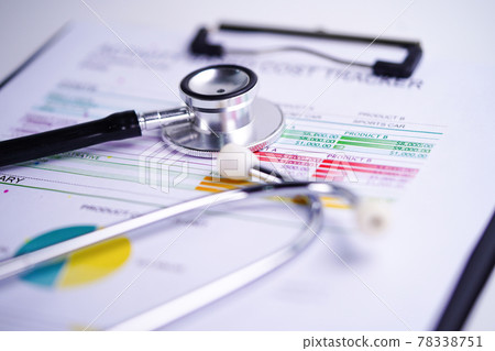 Stethoscope, Charts and Graphs spreadsheet paper, Finance, Account, Statistics, Investment, Analytic research data economy spreadsheet and Business company concept.. 78338751