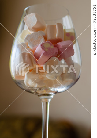 Wine glass with mini marshmallows. Wine glass with mini marshmallows. 78339751
