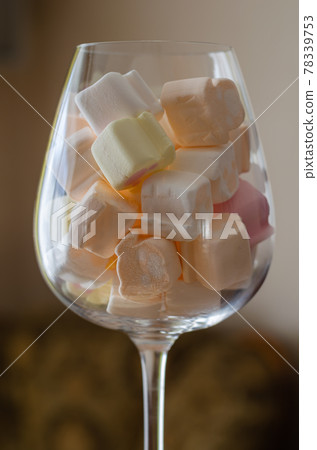 Wine glass with mini marshmallows. Wine glass with mini marshmallows. 78339753