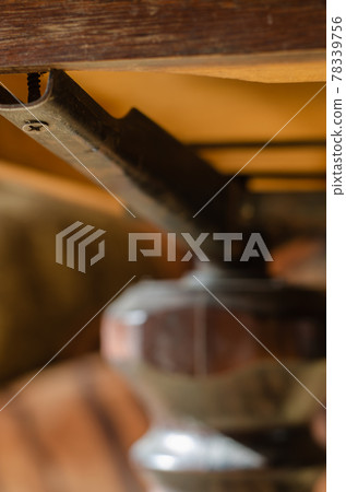 Metal Ceiling support under the roof of the porch. Metal Ceiling support under the roof of the porch. 78339756