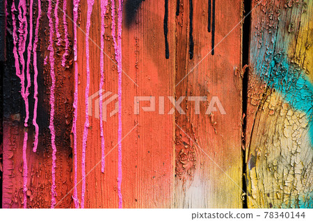 Wall wooden painted with different colors of paints. 78340144