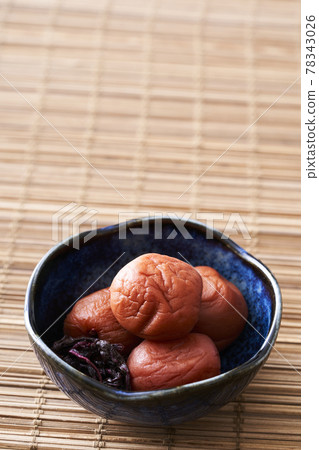 Umeboshi served on a bowl 78343026