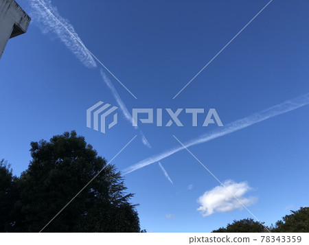 Sunny contrails Rainy day cross 78343359