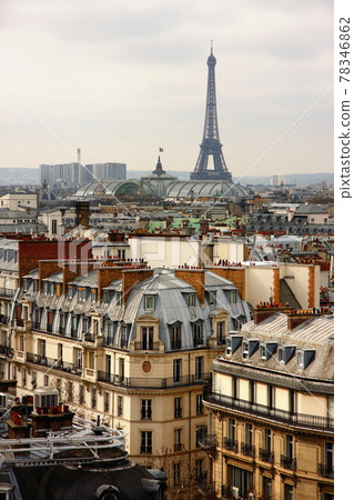 Eiffel tower over the roofs 78346862