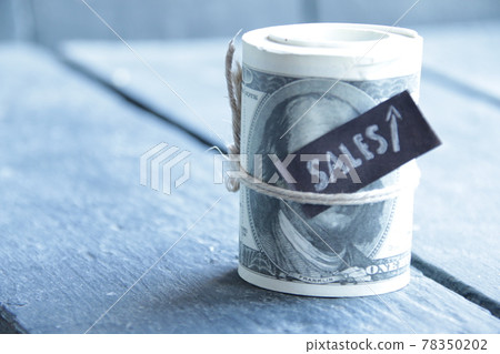 Sales growth idea. Money and tag. Successful business concept. Sales growth idea. Money and tag. Successful business concept. 78350202