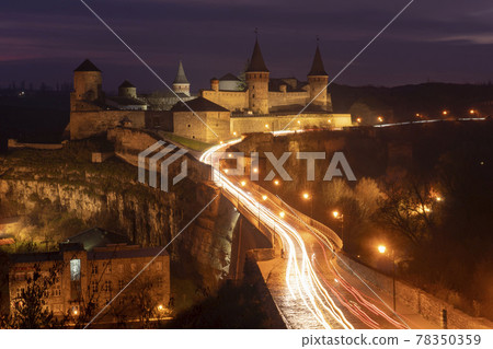 Evening view of the castle Kamyanets-Podilsky, Ukraine Evening view of the castle Kamyanets-Podilsky, Ukraine 78350359