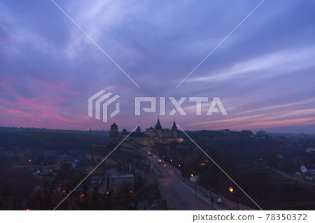 Evening view of the castle Kamyanets-Podilsky, Ukraine Evening view of the castle Kamyanets-Podilsky, Ukraine 78350372