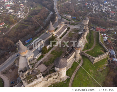 Aerial view of Fortress Castle at SUnrise in historic city of Kamianets-Podilskyi, Ukraine Aerial view of Fortress Castle at SUnrise in historic city of Kamianets-Podilskyi, Ukraine 78350390
