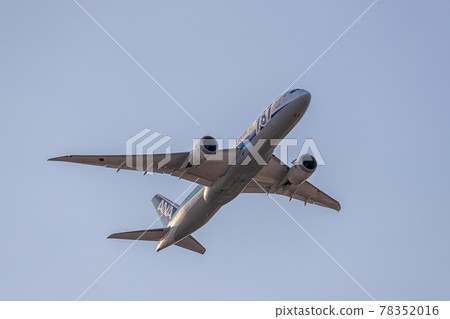 Passenger plane taking off from Osaka Airport Passenger plane taking off from Osaka Airport 78352016