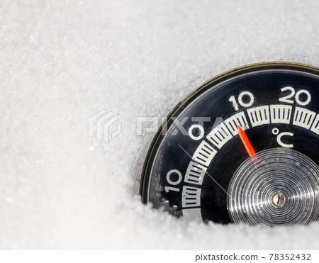 Thermometer in a snow warm winter weather global warming concept Thermometer in a snow warm winter weather global warming concept 78352432