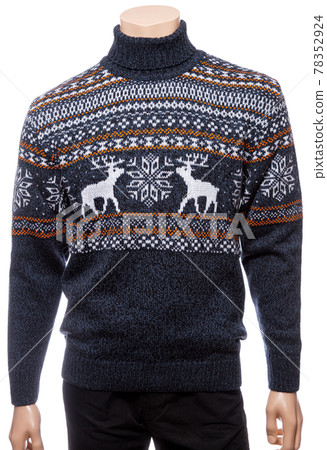 Dark blue knitted Christmas turtleneck sweater on a mannequin isolated 78352924