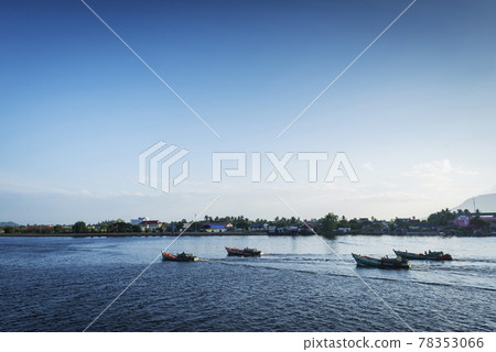 view of traditional fishing boats on kampot river in cambodia view of traditional fishing boats on kampot river in cambodia 78353066