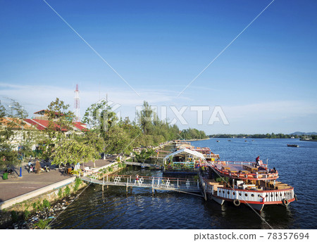 view of river boat restaurants in kampot town cambodia 78357694