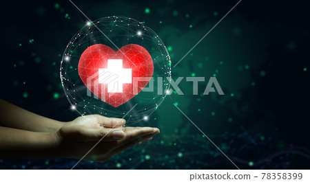 Hand holding red heart with white cross symbol. World map background. Health care, Health insurance, Charity, and Medicine concept. Copy space. Hand holding red heart with white cross symbol. World map background. Health care, Health insurance, Charity, and Medicine concept. Copy space. 78358399