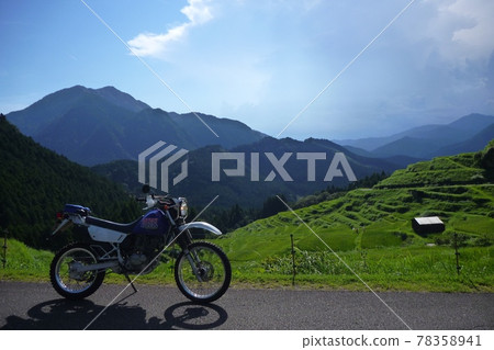 Ride Kinan Maruyama Senhita on a motorcycle. 78358941