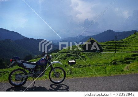 Ride Kinan Maruyama Senhita on a motorcycle. 78358942