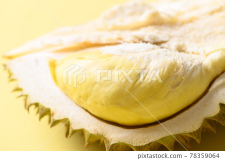 Ripe Thai durian fruit (Monthong) on yellow background, Tropical fruit 78359064
