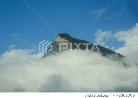 View of alp mountain in autumn top hill on cloudy sky 78362709