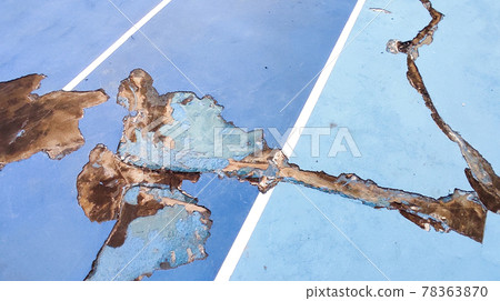 Close up of Ruined blue color Tennis cort Close up of Ruined blue color Tennis cort 78363870