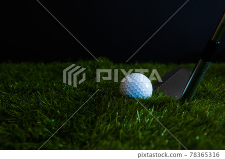 Golf ball lawn black background image material Golf ball lawn black background image material 78365316