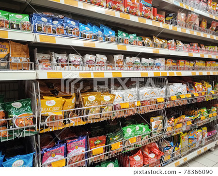 PENANG, MALAYSIA -JANUARY 5, 2021: Selected focused on the spices are sold in commercial packages and displayed on shelves in the supermarket. Sort by brand and type to make it easier to choose.  78366090
