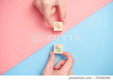 Gender icon on wooden blocks. 78368090