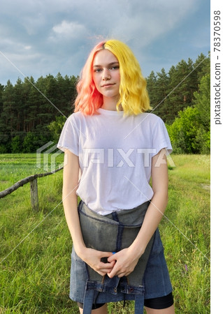 Portrait of teenage girl hipster 15, 16 years old with dyed hair 78370598