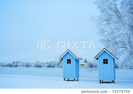Snow scene and blue hut 78370749